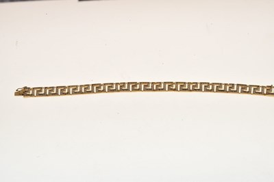 Lot 31 - 9ct gold diamond bracelet of Greek Key design