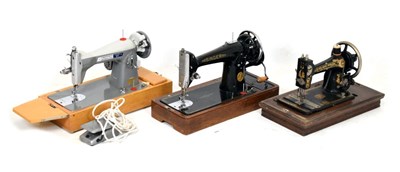 Lot 322 - Three vintage cased sewing machines