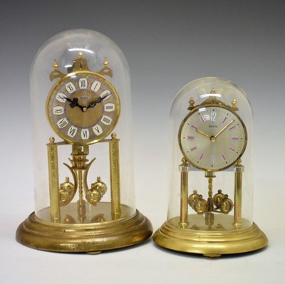 Lot 456 - Haller anniversary clock with dome and a similar anniversary clock