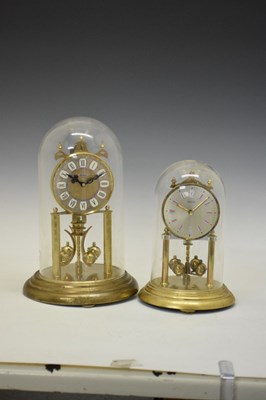 Lot 543 - Haller anniversary clock with dome and a similar anniversary clock