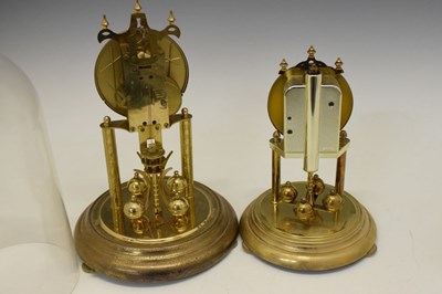 Lot 543 - Haller anniversary clock with dome and a similar anniversary clock