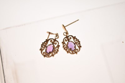 Lot 61 - Pair of unmarked drop earrings set amethyst-coloured stones, and a similar pair of ear studs