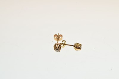 Lot 30 - Pair of 9ct gold and diamond ear studs