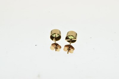 Lot 31 - Pair of 9ct gold and peridot ear studs