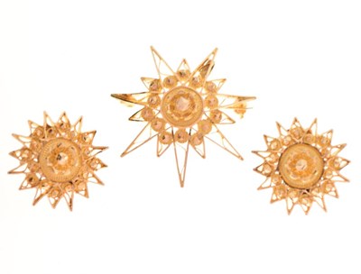 Lot 23 - Turkish yellow metal starburst brooch and matching clip-on earrings