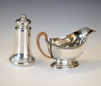 Lot 136 - George VI silver sauceboat and sugar caster