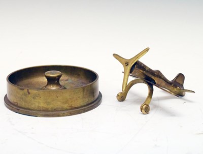 Lot 245 - Second World War Trench Art ashtray and brass plane