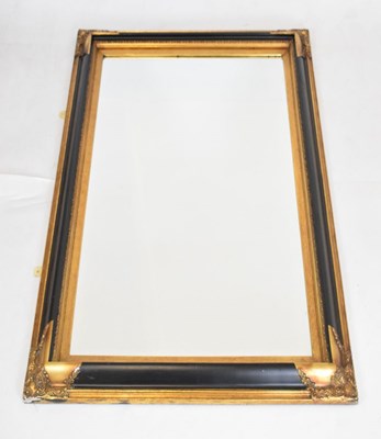 Lot 679 - Black and gilt framed bevelled mirror