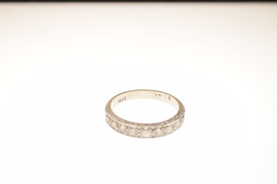 Lot 3 - Nine-stone diamond half-eternity ring