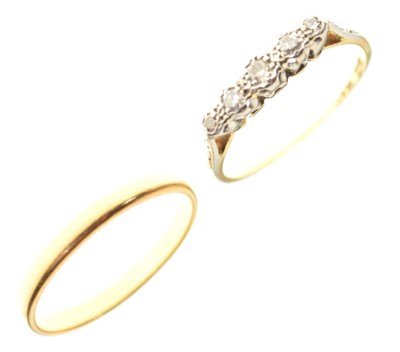 Lot 7 - 22ct gold wedding band and 18ct yellow metal ring set five white stones