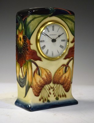 Lot 386 - Moorcroft pottery 'Anna Lily' pattern mantel clock