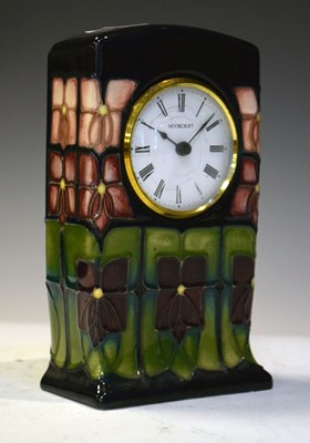 Lot 387 - Moorcroft pottery 'Violet' pattern mantel clock