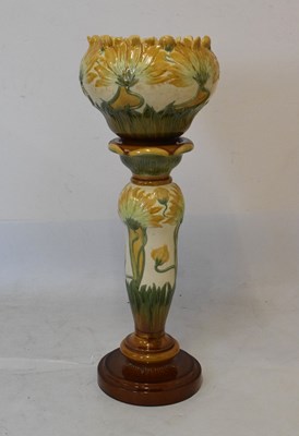 Lot 582 - Burmantofts jardiniere and stand