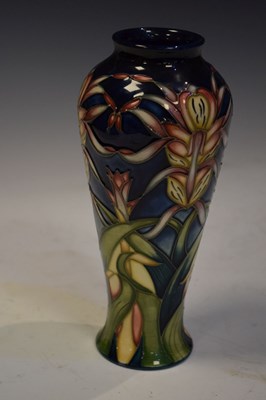 Lot 388 - Moorcroft pottery 'Lizard Orchild' pattern baluster vase
