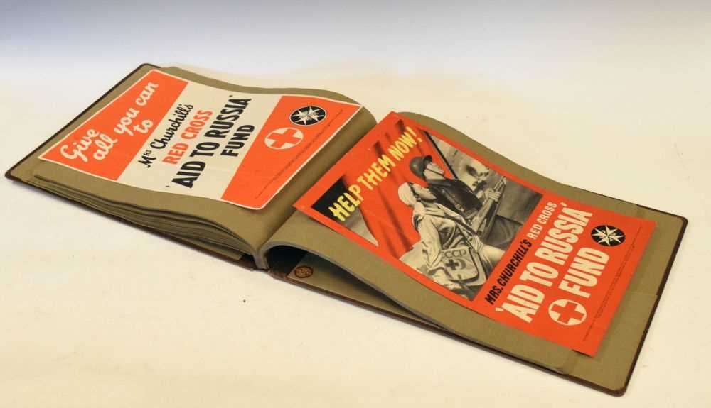Lot 150 - Two Second World War 'Mrs. Churchills' Red Cross Aid to Russia' posters, in album