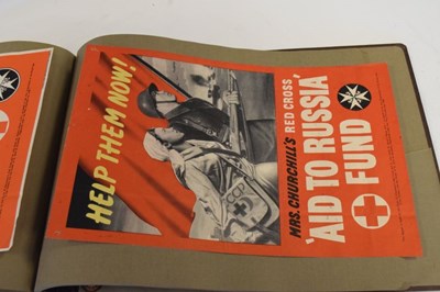 Lot 150 - Two Second World War 'Mrs. Churchills' Red Cross Aid to Russia' posters, in album