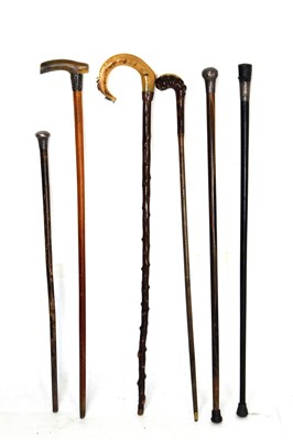 Lot 210 - Collection of six walking sticks and canes