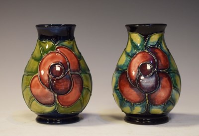 Lot 395 - Two small Moorcroft pottery 'Moorcroft Rose' pattern bulbous vases