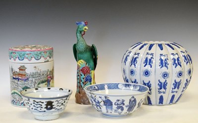 Lot 550 - Two Chinese blue and white bowls, glazed Chinese figure of a bird, etc