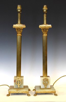Lot 567 - Pair of late 20th Century brass and onyx table lamps