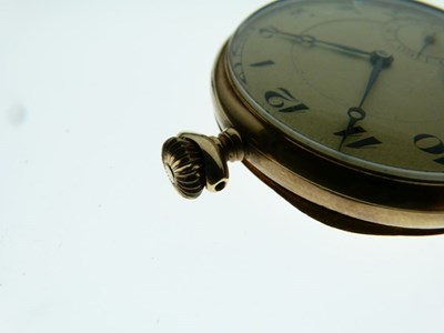 Lot 142 - 14K open face pocket watch