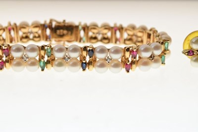 Lot 21 - Cultured pearl, diamond, ruby, sapphire and emerald bracelet