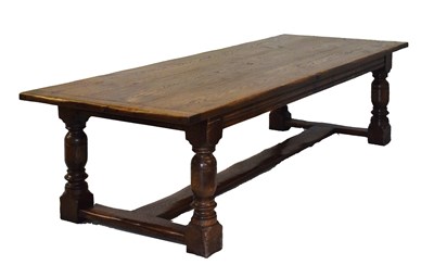 Lot 493 - Large Bright's of Nettlebeds reproduction oak refectory style dining table