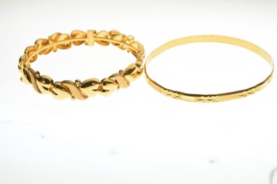 Lot 54 - Two yellow metal bangles 37.4g approx