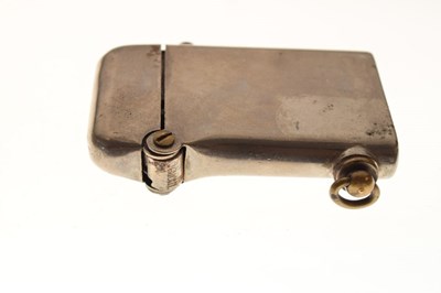 Lot 277 - Thorens cigarette lighter  together with a silver pipe tamper
