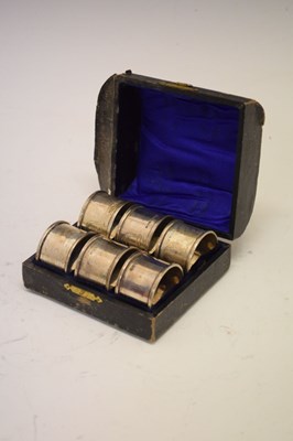Lot 144 - George V cased of six napkin rings