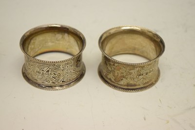 Lot 146 - Three Edward VII silver napkin rings, together with four mixed napkins (7)