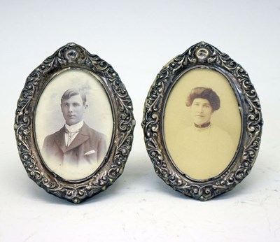 Lot 130 - Pair of silver mounted oval picture frames