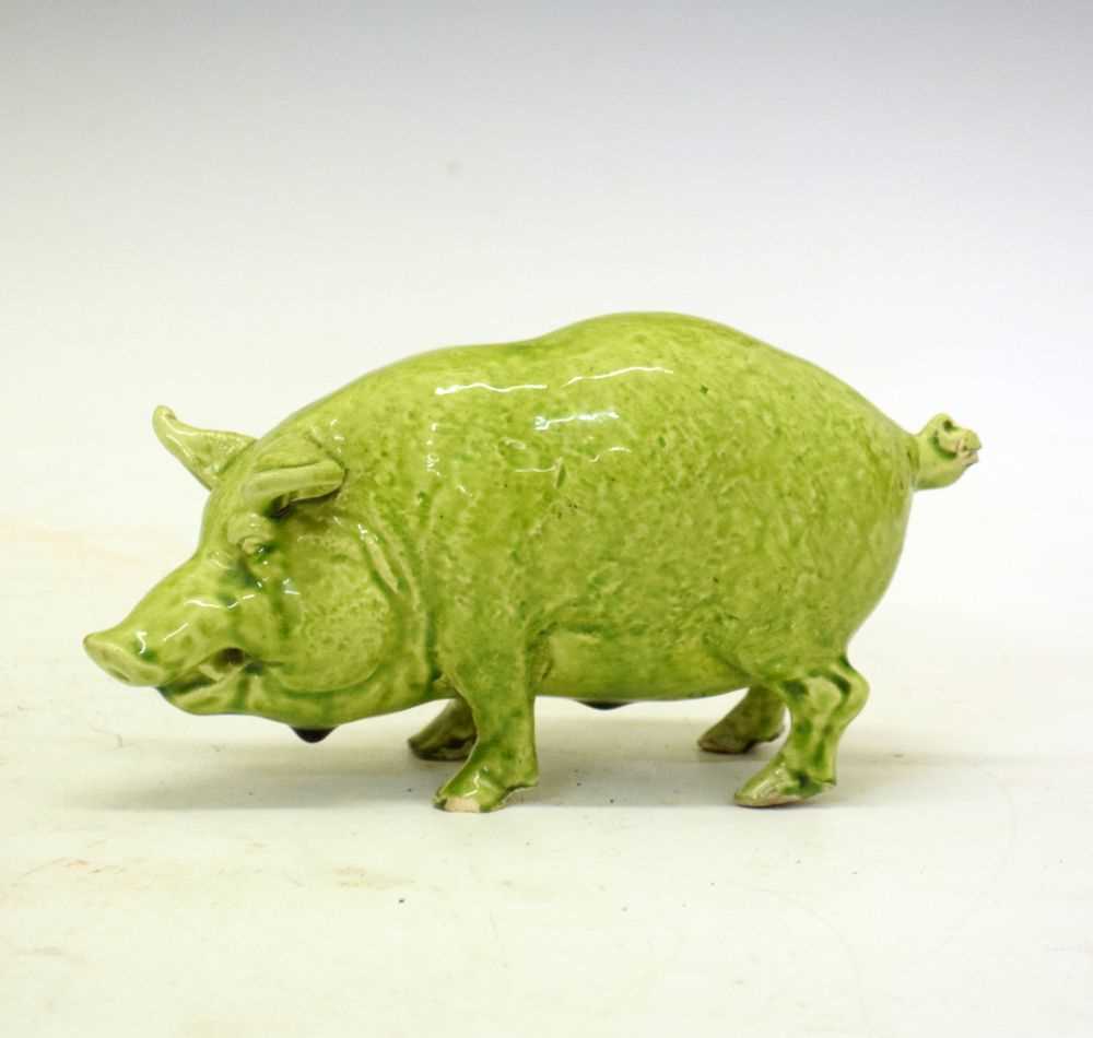 Lot 282 - Green glazed model of a Sussex pig