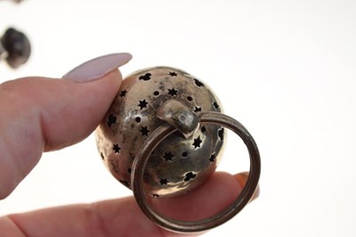 Lot 102 - 19th Century child's white metal rattle with coral teether, and acorn rattle (2)