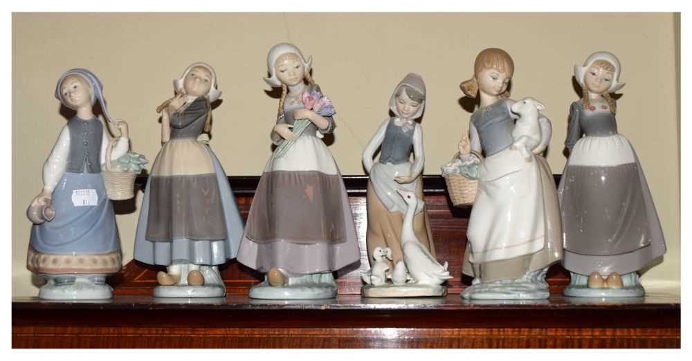 Lot 323 - Lladro - Six porcelain female figures