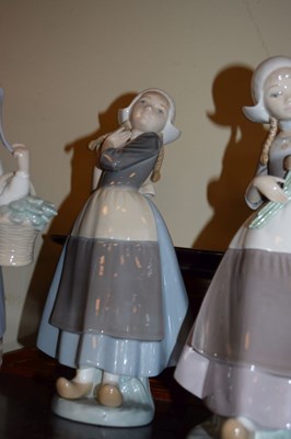 Lot 323 - Lladro - Six porcelain female figures