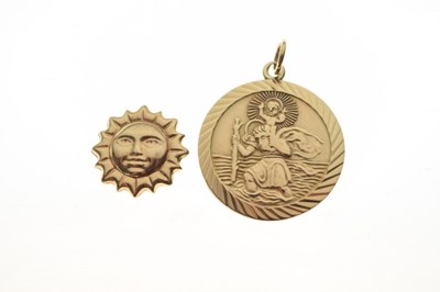Lot 80 - 9ct gold St Christopher pendant, and an unmarked sun motif charm