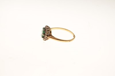 Lot 13 - Emerald and diamond cluster ring, the shank stamped '18ct'