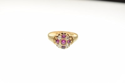 Lot 6 - 18ct gold ruby and diamond cluster ring