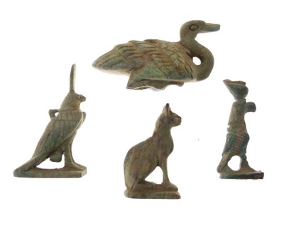 Lot 171 - Four Egyptian carved green soapstone artefacts