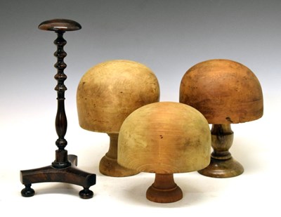 Lot 214 - Rosewood turned wig stand and three pine wig stands