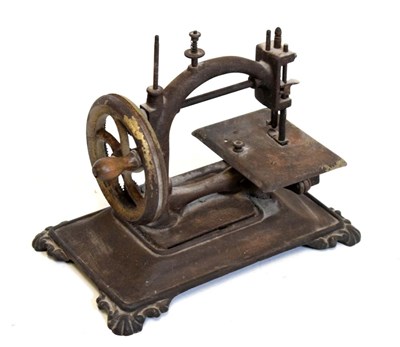 Lot 697 - 19th Century cast metal sewing machine