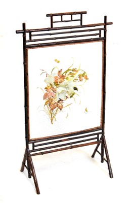 Lot 672 - Glazed painted bamboo-framed fire screen