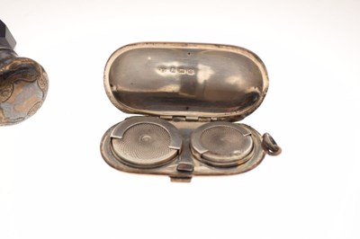 Lot 131 - Silver sovereign holder and a scent bottle