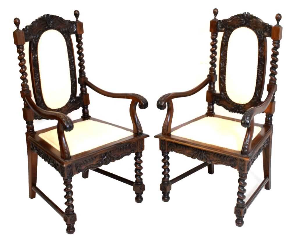 Lot 365 - Pair of reproduction chairs with carved decoration and padded backs