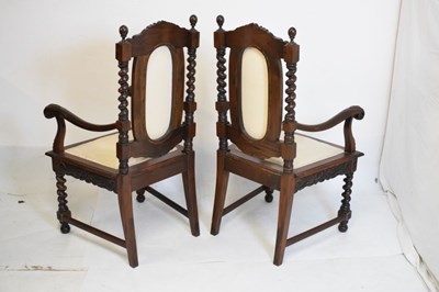 Lot 365 - Pair of reproduction chairs with carved decoration and padded backs