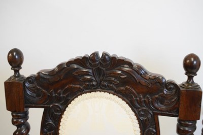 Lot 365 - Pair of reproduction chairs with carved decoration and padded backs