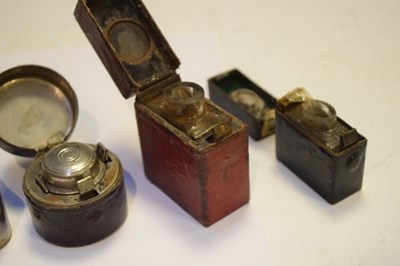 Lot 187 - Seven late 19th and early 20th Century travelling inkwells