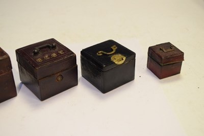 Lot 185 - Five late 19th and early 20th Century travelling inkwells, - travelling cases
