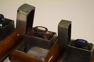 Lot 180 - Four 'Ransome's Patent' travelling inkwells